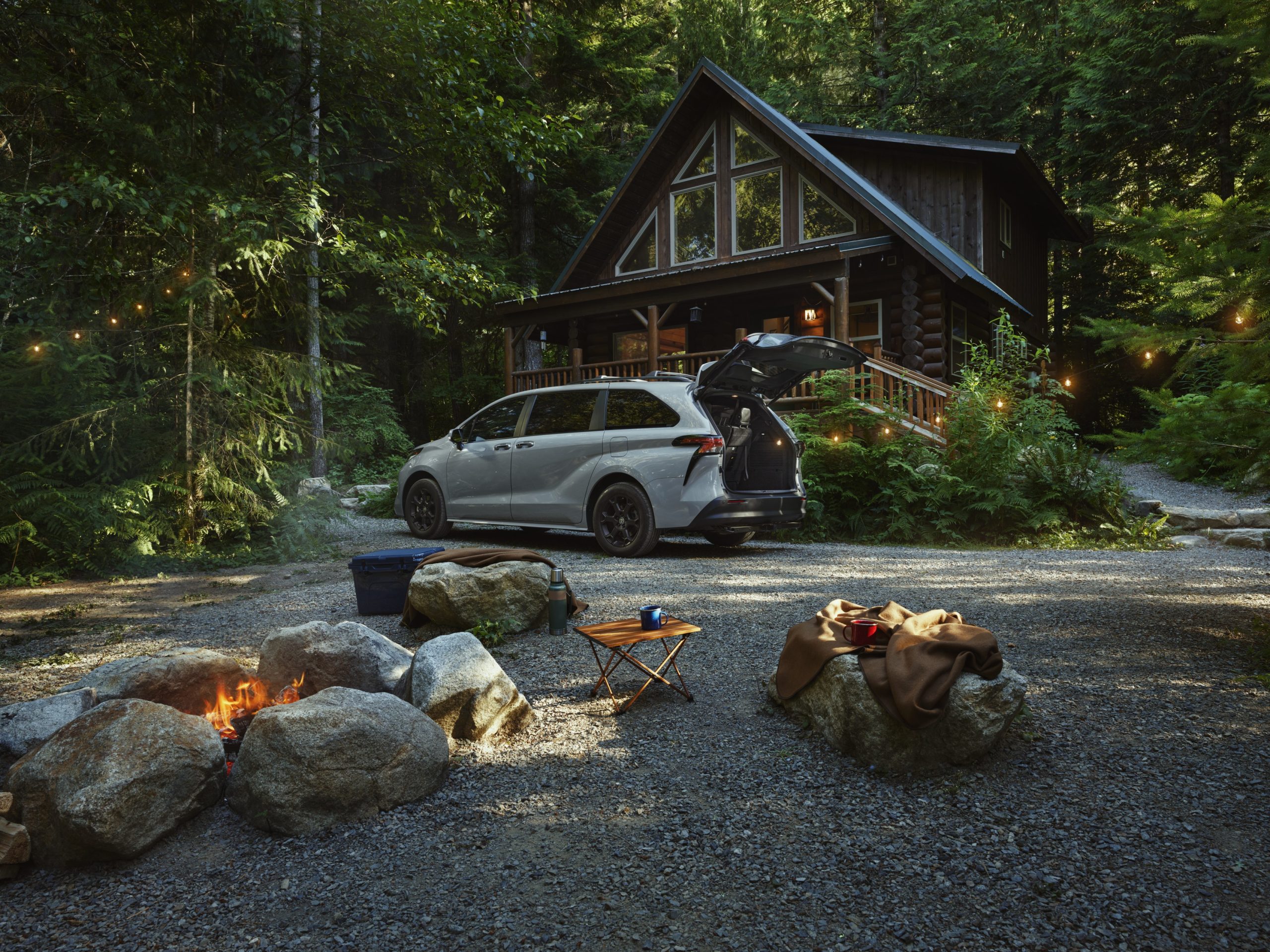 2026 Toyota Sienna outside a cabin in the woods