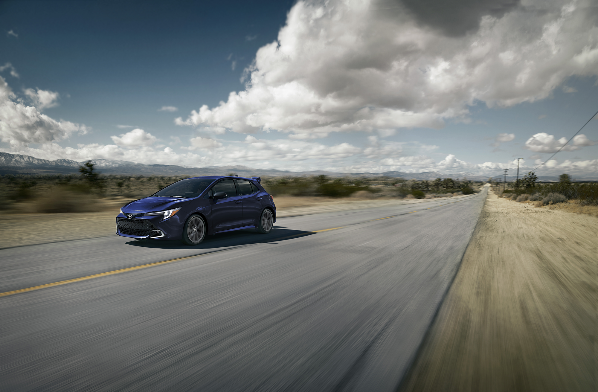 2027 Toyota Corolla Hatchback driving on a highway